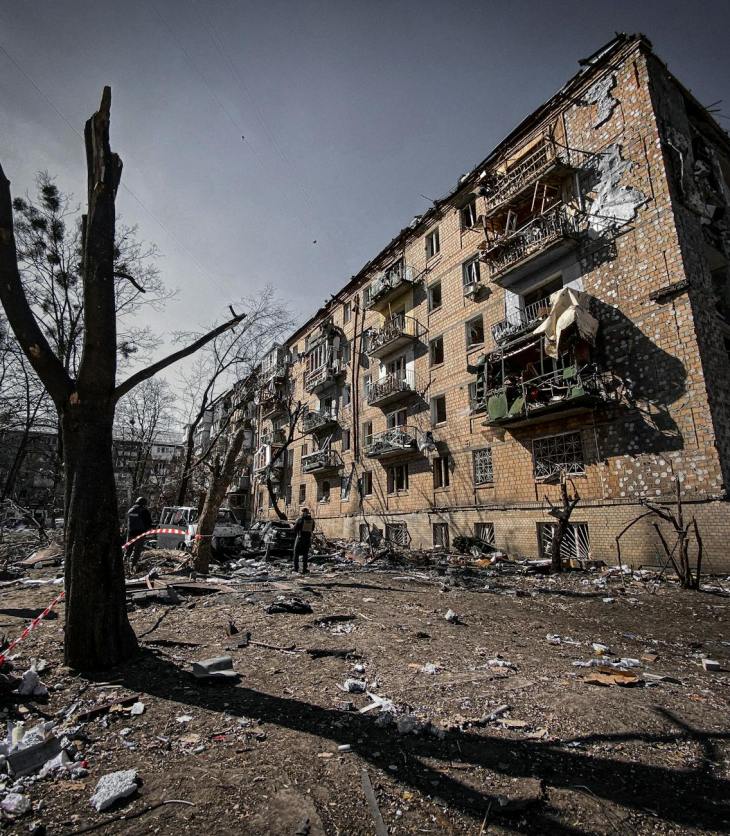 destroyed residential building under gray sky